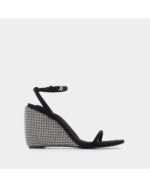 Dahlia 105 pumps in zwart lycra