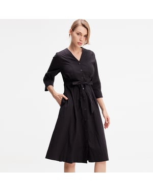 Minimalistische katoenen shirtjurk met geknoopte riem