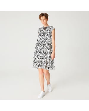 Korte jurk met ruches en bloemenprint