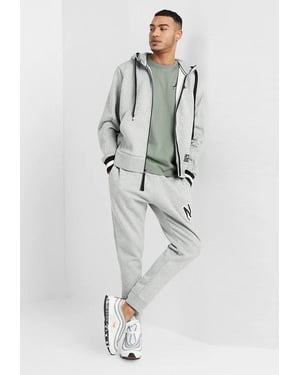 Nike Air heren trainingspak met doorlopende ritssluiting volledig in grijs