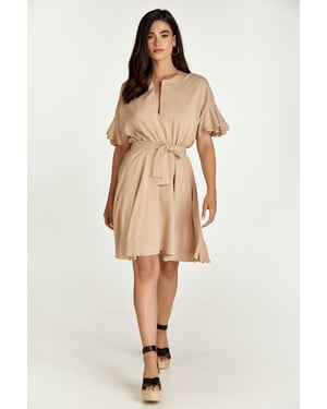 Beige jurk met ruches