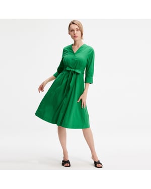 Minimalistische katoenen shirtjurk met geknoopte riem