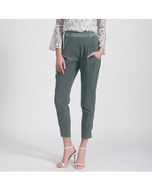 Bi-materiaal taps toelopende broek