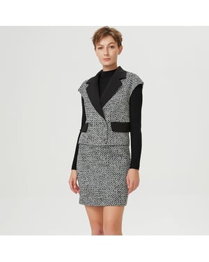 Tweedvest met contrasterende kraag