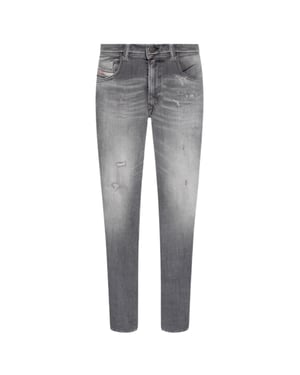 Diesel 1979 Sleenker rafelige grijze vervaagde denimjeans