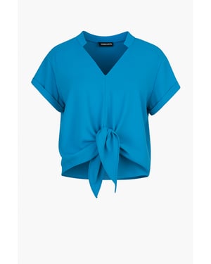Blouse met gestrikte voorkant in azuurblauw – 100% viscose-voile