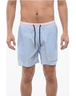 Tweekleurige boxerbadpak in blauw, roze
