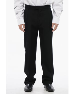 Dubbelgeplooide wollen broek met hoge taille in zwart