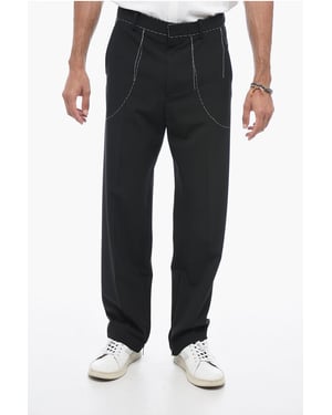 Broek op maat met stikseldetails in zwart