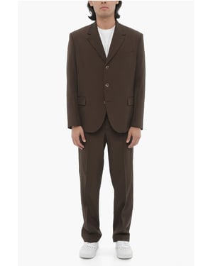 Zijsplitten, reverskraag, slim fit, drieknoops pak in bruin