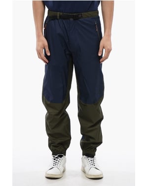Tweekleurige SPRINGER-broek in Blu, Verde