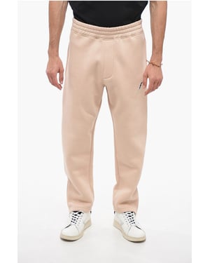 Geborduurde BOLT-joggingbroek met rits aan de manchetten in beige