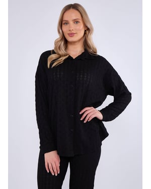 Zwart gestructureerd oversized shirt met lange mouwen