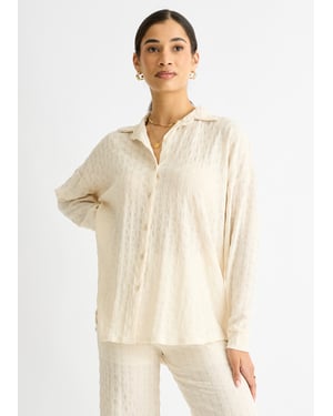 Beige getextureerd oversized shirt met lange mouwen