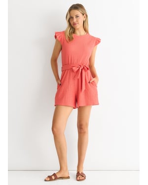 Koraalkleurige playsuit met elastische tailleband, ruches en stretchtextuur