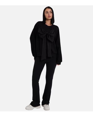 Zwarte oversized trui met strik aan de voorkant