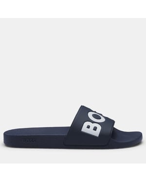 Boss Aryeh herenslippers, Italiaans gemaakt, met groot logo in donkerblauw.