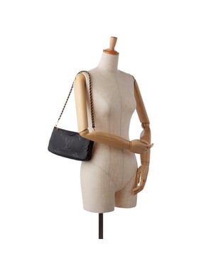 Pochette Mtis Schoudertas M44875