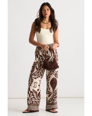 Chocoladebruine broek met elastische tailleband en randprint