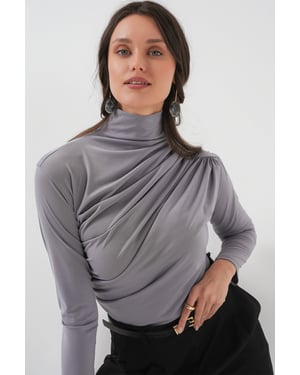 Aansluitende colblouse met drapeer-detail