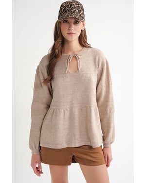 V loose knit sweater met strikdetails