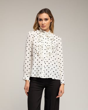 Blouse met stippen en ruches op de borst