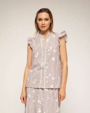 Gestreepte blouse met borduursels en kantdetail met ruches aan de mouwen