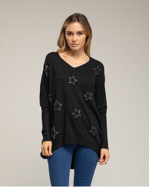 Oversized lange gebreide trui met opgetikte stoffen sterren met strass.