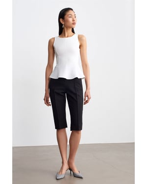 Fitted Mouwloze Crepe Peplum Blouse