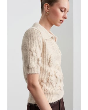Gecapitonneerde Ribbels Polo-colberttrui