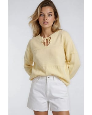 V loose knit sweater met strikdetails