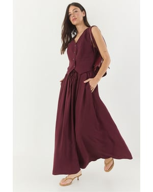 V-hals Vest en Maxi Rok Twee-Stuk Coördinaat Set