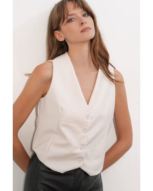 Faux leren V-hals knooploze cropped vest