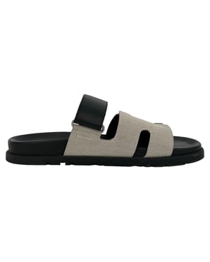 Hermès Chypre sandalen in wit en zwart canvas en leer