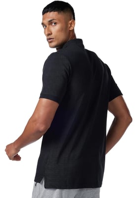 Nike Sportswear Club herenpoloshirt in zwart