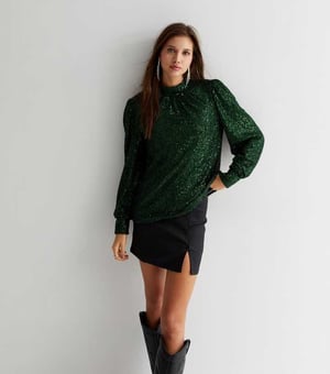 Loosefit blouse met hoge hals en pailletten