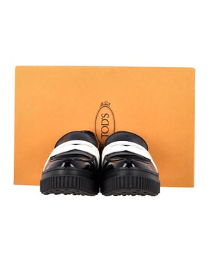 Tod's Platform Penny Loafers in Zwart Leer