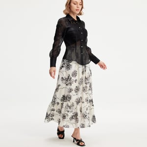 Lange rok met lineaire print en ruches