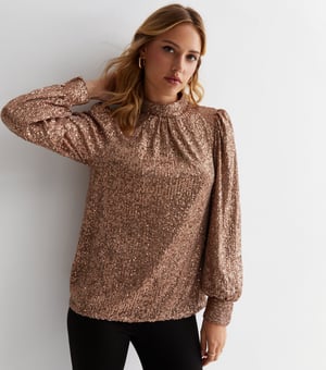 Loosefit blouse met hoge hals en pailletten