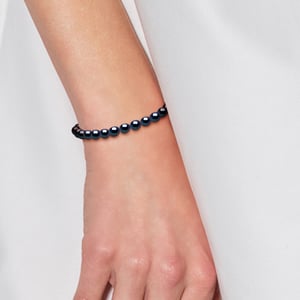 Kralen armband Zoetwater Rijstkorrels 4-5mm Zwart Wit Goud 18 Karaat