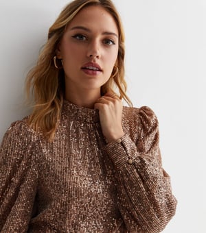 Loosefit blouse met hoge hals en pailletten