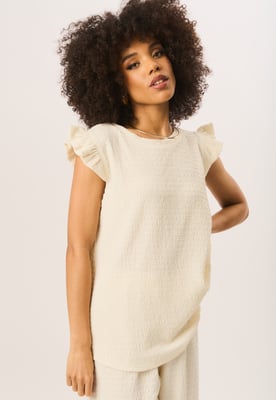Oversized top met ruches en mouwen