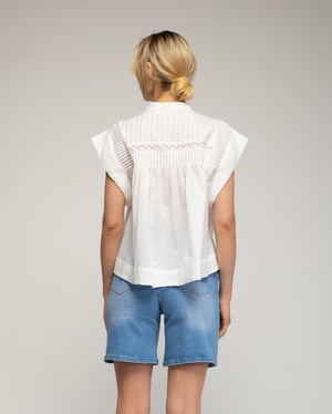 Oversized mouwloze top met plooien