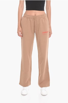 Wijde WORKSHOP-joggingbroek met logoprint in beige