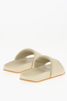 Effen leren slippers in beige