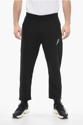 Losse joggingbroek van katoenmix met enkelrits in zwart