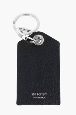 Sleutelhanger met getextureerde leren hanger en bliksemschichtdetail in blauw, zwart