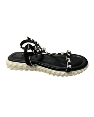 Valentino Garavani Rockstud Enkelsandalen met Platte Zool in Zwart Suède
