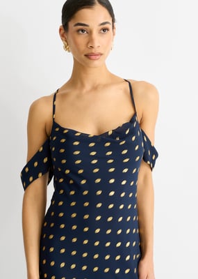 Marineblauwe maxi-jurk met col, afhangende mouwen en folieprint