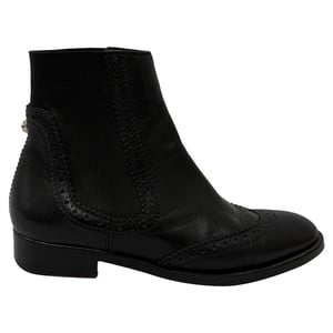 Balenciaga Geperforeerde Wingtip Chelsea Boots in Zwart Leer